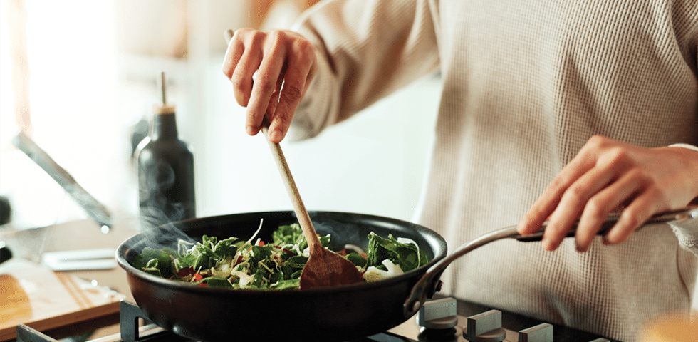 person cooking following rural alaskan nutrition tips