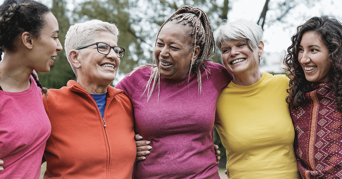 Five women smiling.