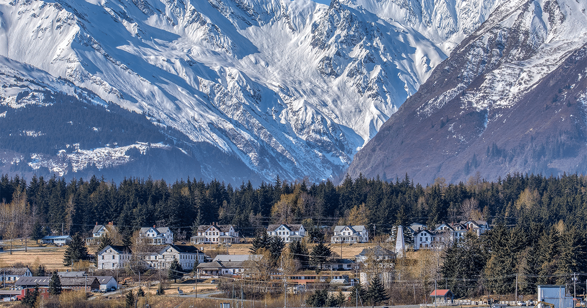 Rural Alaskan village in a mountain valley.